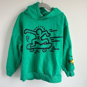 H&M Keith Haring Green Hoodie with Black Skate Graphic
